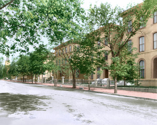 A colorized street level view of Lucas Place, circa 1885